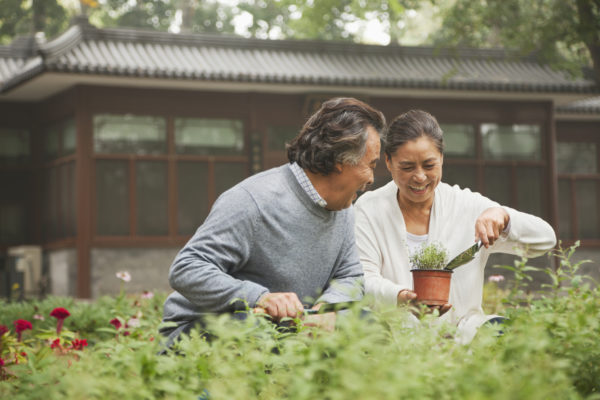 elderly Chinese couple in garden